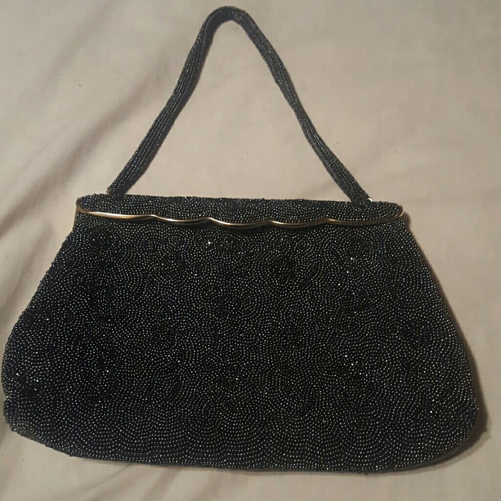 Little black spring hinge purse from edb.robinson